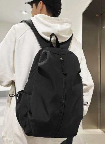 Black stylish versatile backpack with multiple compartments