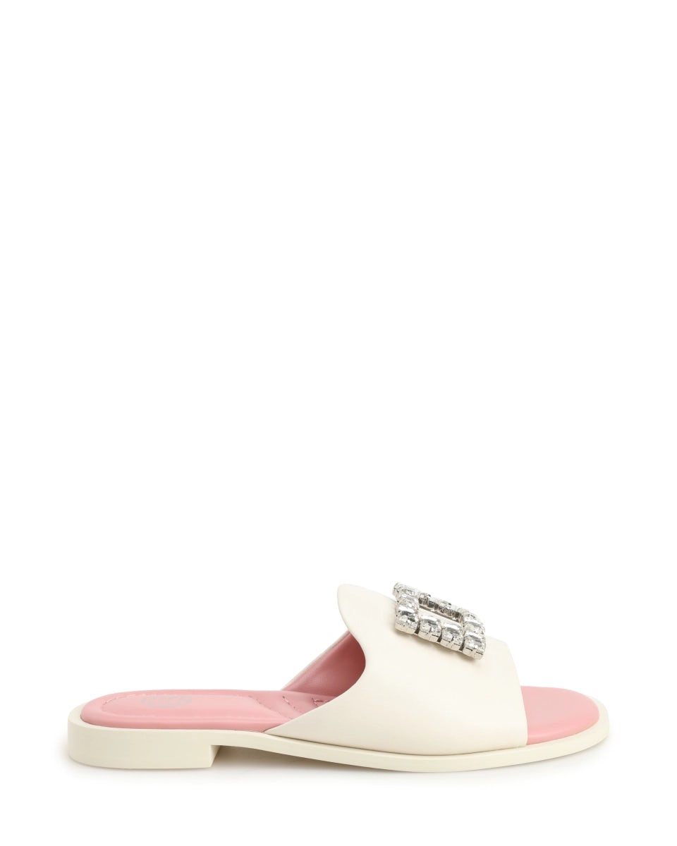 Mules with a rhinestone-embellished buckle