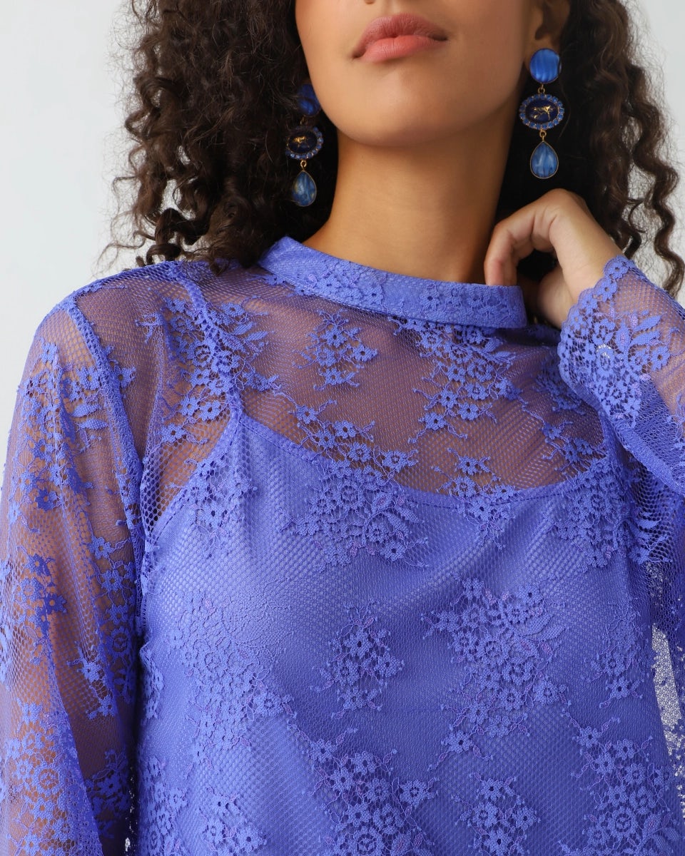 Lace blouse with an inner camisole