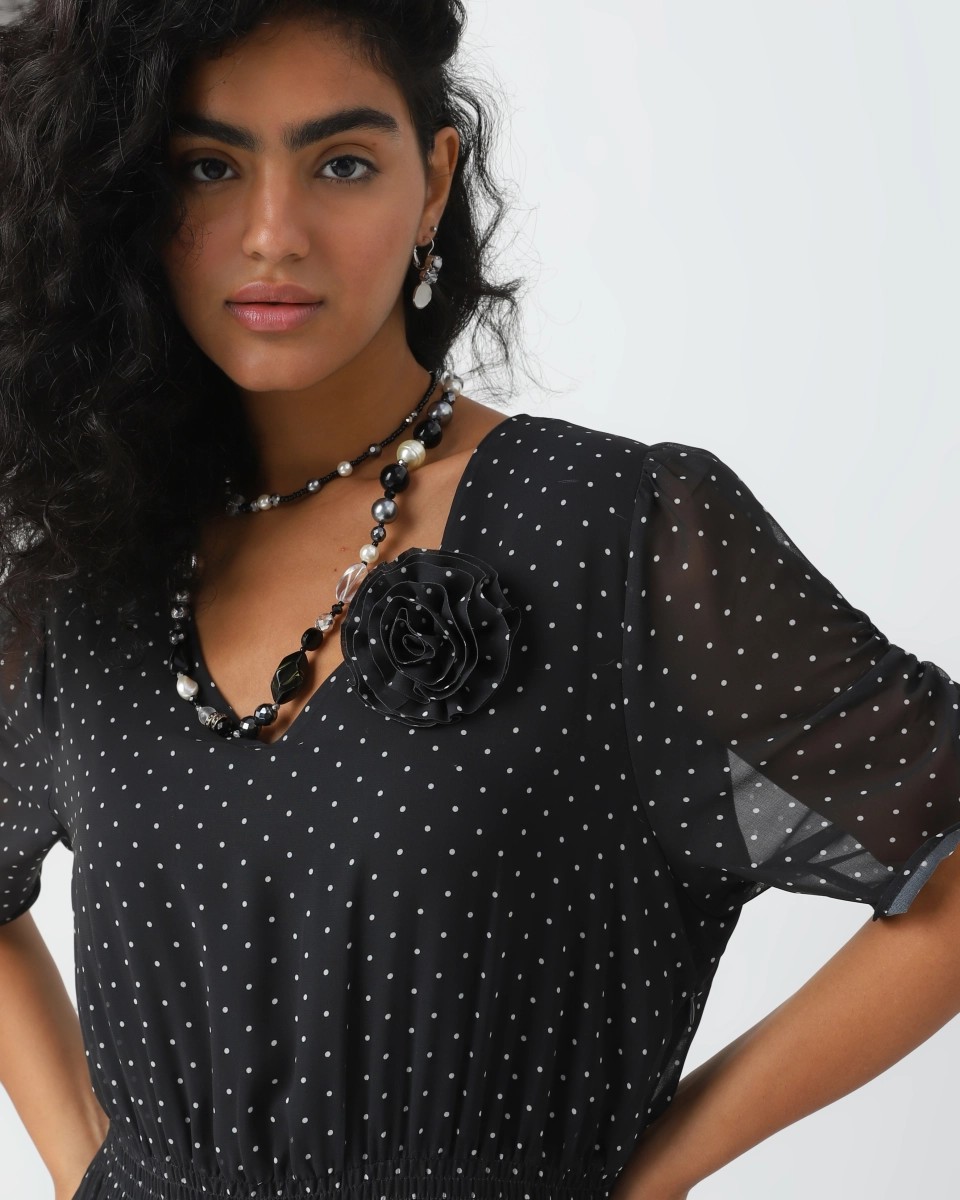 Polka dot dress with ruffles