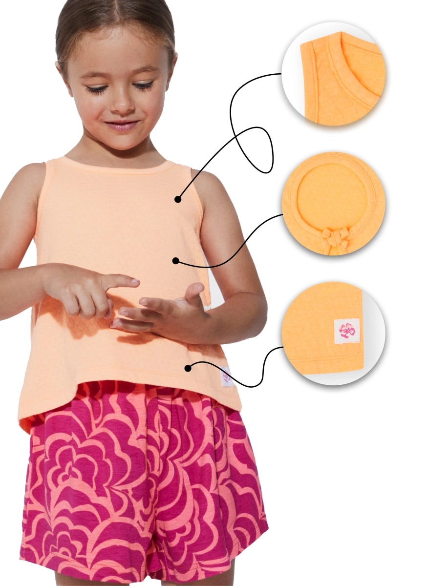 Printed orange cotton sleeveless top for girls