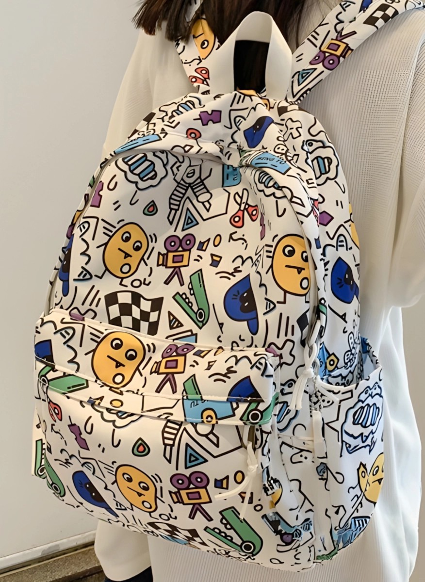 Cartoon print backpack with accessory pockets