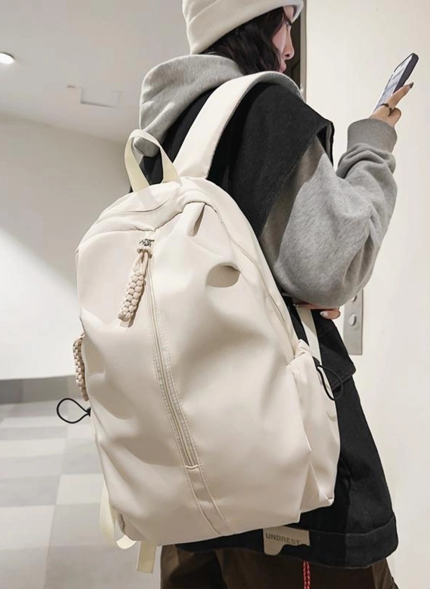 White stylish versatile backpack with multiple compartments