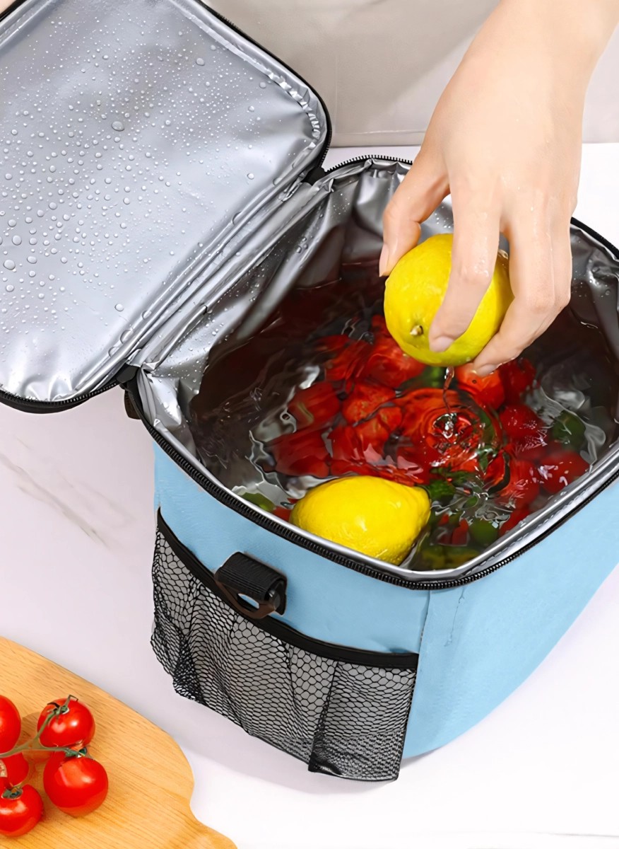 Blue insulated lunch bag with shoulder strap